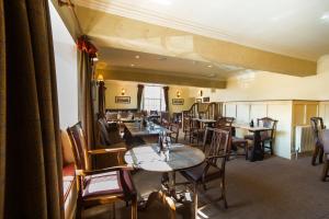 A restaurant or other place to eat at Assheton Arms 