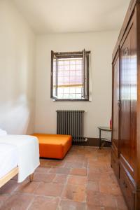 Postel nebo postele na pokoji v ubytování Frantoio Del Moscatello