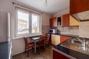 Kuchyň nebo kuchyňský kout v ubytování Mieszkanie Przy Wieżach + 10 fotografií