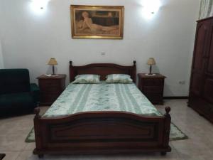 Rúm í herbergi á Cozy Room in Plateau