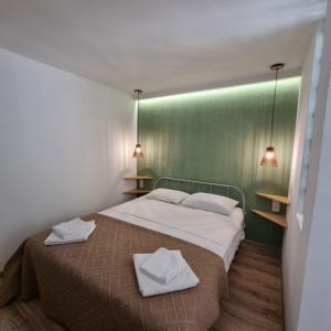 Voodi või voodid majutusasutuse River House Boutique Hotel toas