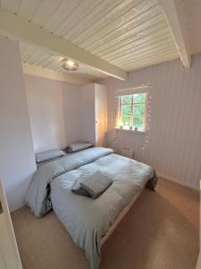 Postel nebo postele na pokoji v ubytování Cozy child-friendly house + 37 fotografií