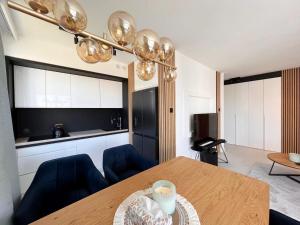 Posedenie v ubytovaní Apartament Orro Mare