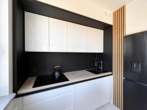 Kuchyňa alebo kuchynka v ubytovaní Apartament Orro Mare
