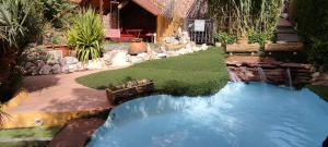 Piscina en o cerca de Viviendas Uso Turisitico, Al BUHAR