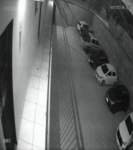 a group of cars parked in a parking garage at LOCANDA DA SERRA - Aptos Mobiliados por Temporada in Barra do Garças