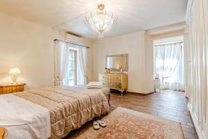 Posteľ alebo postele v izbe v ubytovaní Villa Cedri