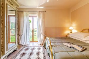 Posteľ alebo postele v izbe v ubytovaní Villa Cedri