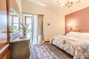 Posteľ alebo postele v izbe v ubytovaní Villa Cedri