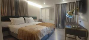 Ένα ή περισσότερα κρεβάτια σε δωμάτιο στο Hotel 4 Estações