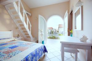 Postel nebo postele na pokoji v ubytování Residenza a due passi dal mare