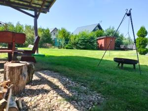 Vonkajšia záhrada v ubytovaní Słoneczna Polana Słajszewo domek Karolina