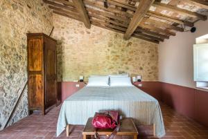 Agriturismo Casalino18客房内的一张或多张床位