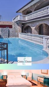 a large swimming pool in a house at Casa Oasa in Marezige