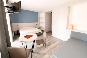TV a/nebo společenská místnost v ubytování Hotel Posta
