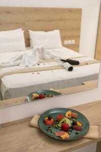 Postel nebo postele na pokoji v ubytování Hotel Philoxenia