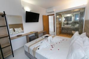 Postel nebo postele na pokoji v ubytování Hotel Philoxenia