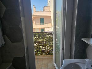 Fotografie z fotogalerie ubytování A Polignano Rooms v destinaci Polignano a Mare