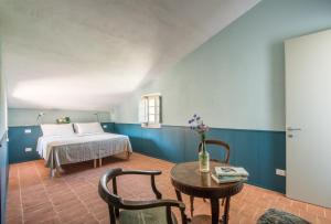 Agriturismo Casalino18客房内的一张或多张床位