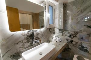 Koupelna v ubytování Hotel Philoxenia