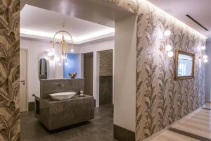Postel nebo postele na pokoji v ubytování Hotel Matheo Villas & Suites