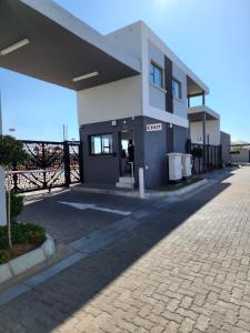 a building on the side of a road at SaronaC102 in Gaborone