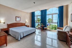 Postel nebo postele na pokoji v ubytování Bahía Tropical + 37 fotografií