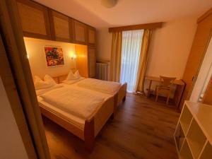 Postel nebo postele na pokoji v ubytování Hotel Meisules