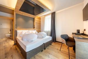 Postel nebo postele na pokoji v ubytování Suite del Podesta' + 7 fotografií