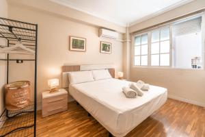Posteľ alebo postele v izbe v ubytovaní Gran apartamento de 3 habitaciones junto a la Catedral