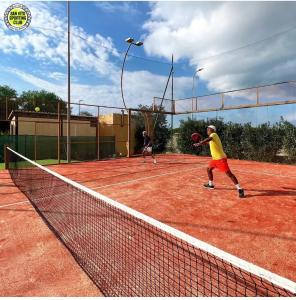 Tenis alebo squash v ubytovaní cico appartamento alebo jeho okolí
