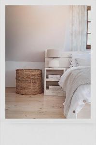 Posteľ alebo postele v izbe v ubytovaní FORMA Apartament Supraśl