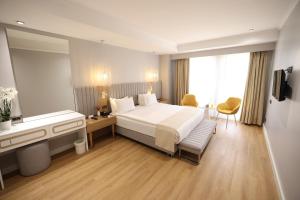 Postel nebo postele na pokoji v ubytování Sundance Hotel Istanbul