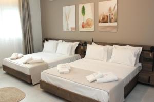 Cama ou camas em um quarto em UrbanBay Hotel & Spa