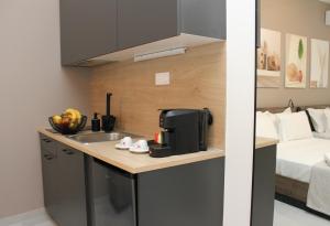 Cama ou camas em um quarto em UrbanBay Hotel & Spa