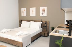 Cama ou camas em um quarto em UrbanBay Hotel & Spa