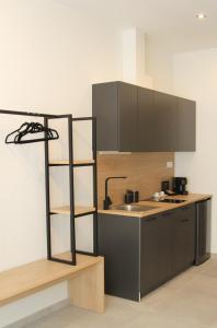 A cozinha ou cozinha compacta de UrbanBay Hotel & Spa