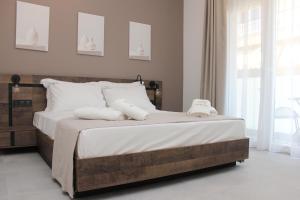 Cama ou camas em um quarto em UrbanBay Hotel & Spa