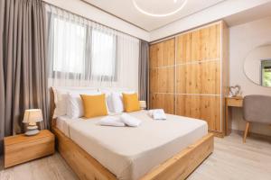 Katil atau katil-katil dalam bilik di Kallithea Village hotel