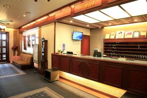 a lobby with a wine tasting counter in a store at Nagano Daiichi Hotel in Nagano