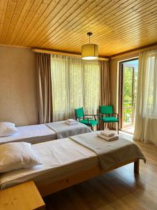 Postel nebo postele na pokoji v ubytování Bala's House