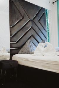 Кровать или кровати в номере Belvedere Apartment