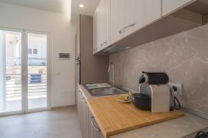 Cucina o angolo cottura di Apt Giulia a due passi dal mare