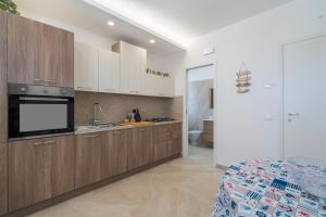 Cucina o angolo cottura di Apt Giulia a due passi dal mare