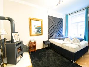 Posteľ alebo postele v izbe v ubytovaní Belvedere Apartment