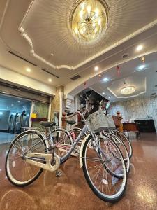 a group of bikes parked in a room at Abbo Hotel in Tainan