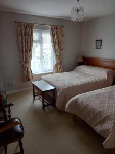 Postel nebo postele na pokoji v ubytování Villa Pio Accommodation Cong