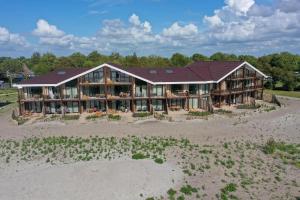 an aerial view of a house on the beach at Soal Beach Resort in Workum