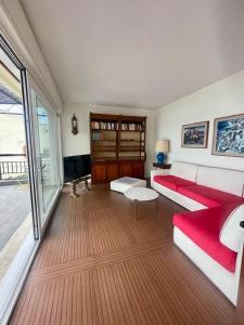 a living room with a couch and a table at La Grande Terrazza in Portovenere