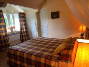 Letto o letti in una camera di Château Maucaillou
